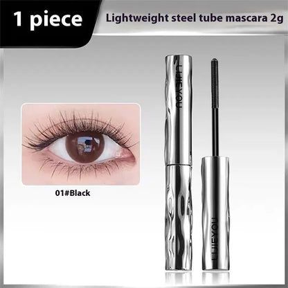 Waterproof mascara in steel tube with optional eyelash curler in black and brown colours