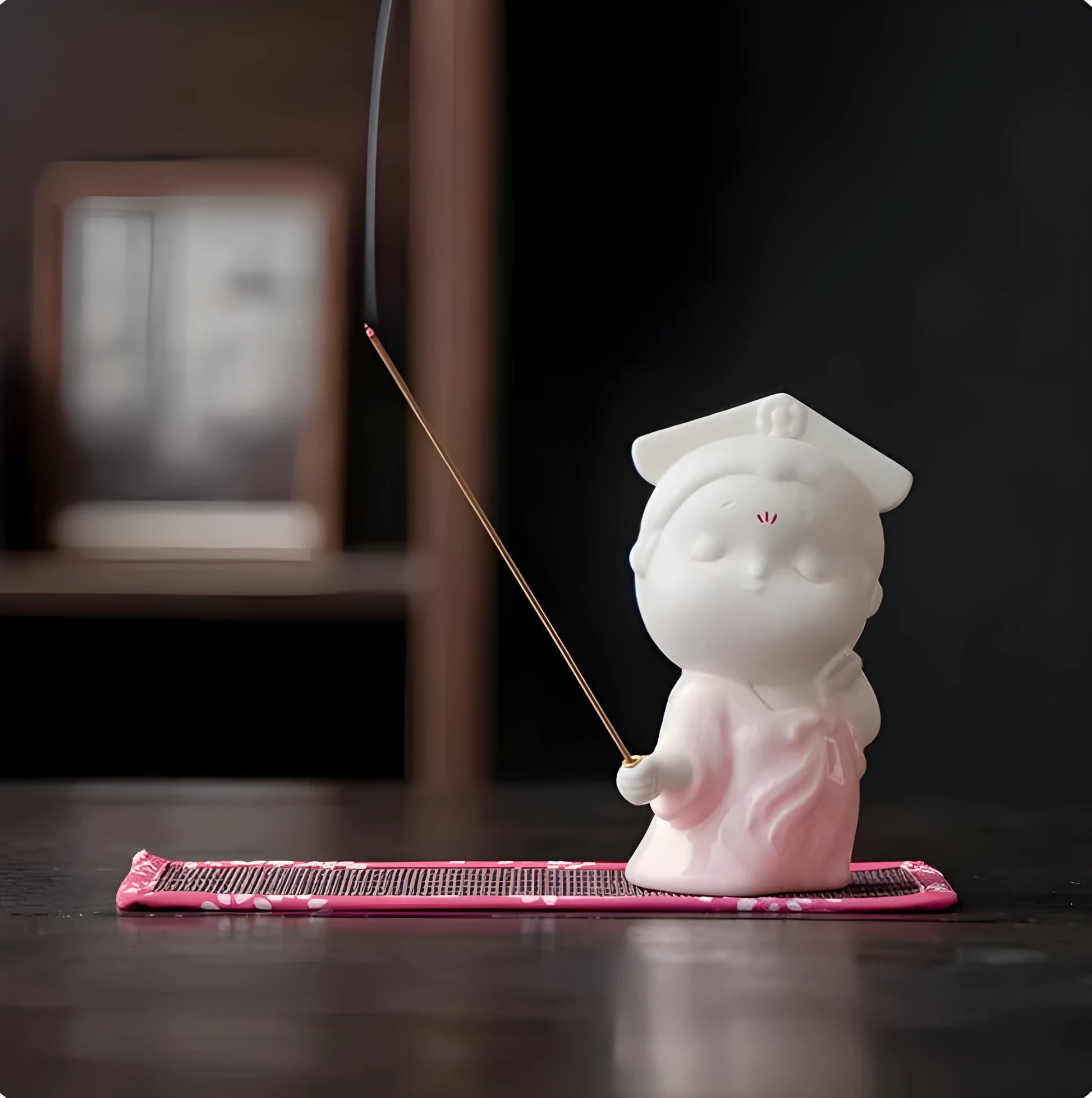 Ceramic cute female court attendant incense burner decoration in Qingge red colour.