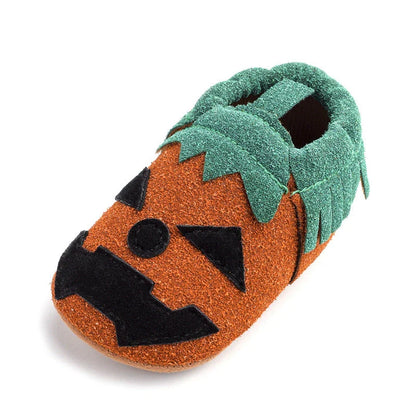 Adorable pumpkin-themed baby shoes with soft suede upper and non-slip canvas sole, available in vibrant yellow color and range of sizes