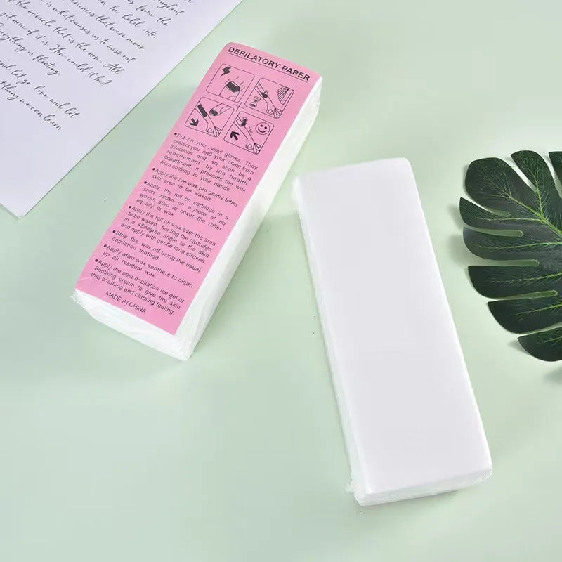 A pack of non-woven fabric hair removal wax paper auxiliary strips.