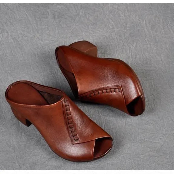 Women's black square heel peep toe slippers with a fish mouth scaffold design and rubber sole.