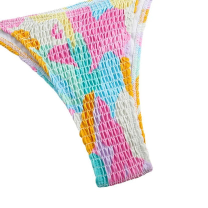 Women's triangle bag bikini swimsuit with floral gradient print and smocking craft detail