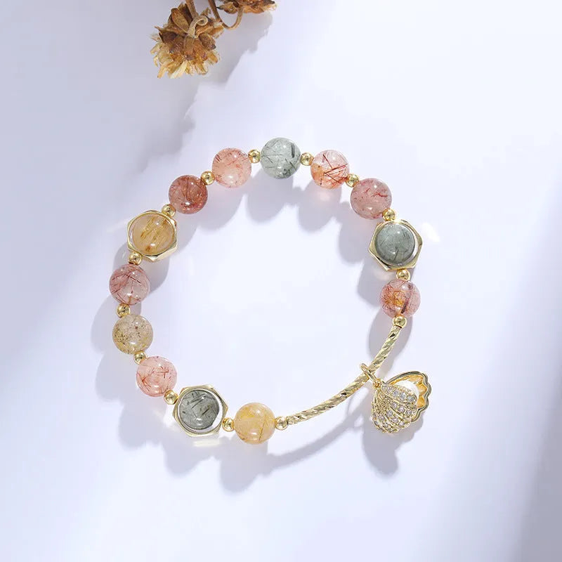Women's cartoon style crystal bracelet with colourful hair crystal shell and red sealant flower shell designs