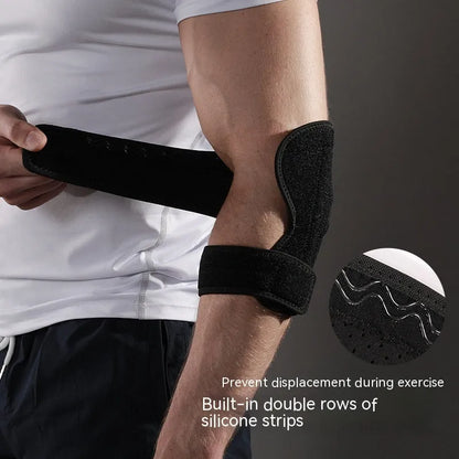 Black adjustable sports elbow guard worn on an adult arm.