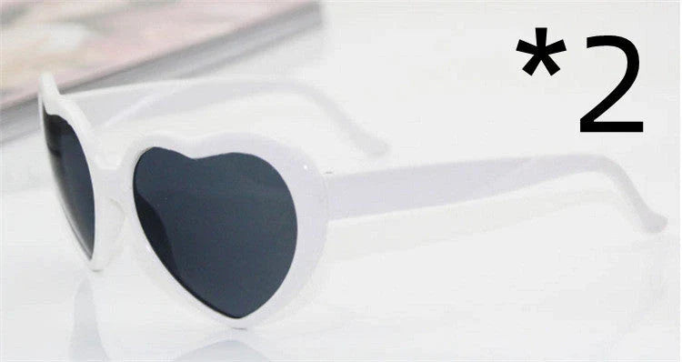 Stylish heart-shaped lighting sunglasses with a plastic frame and resin lenses, creating a mesmerizing effect for romantic occasions