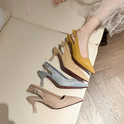 Apricot suede women's pointed-toe stiletto high heels on a plain background.