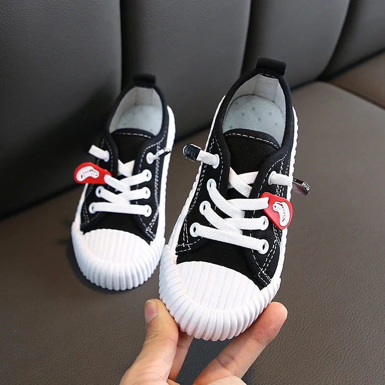 Korean style children's canvas shoes in black, red, yellow or white with non-slip rubber soles