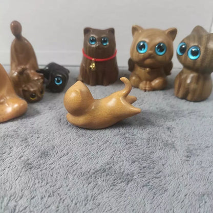 Handmade green sandalwood kitten ornament with unique design