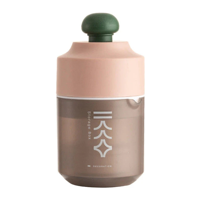 Premium manual citrus juicer in white, green, and pink colors, featuring a compact, portable design for effortless juice extraction