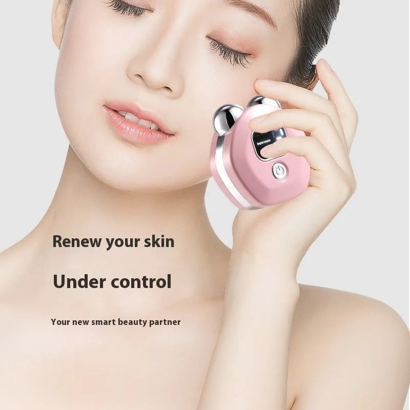 White portable micro current massage instrument with double-roller design and hot compress function for skin rejuvenation