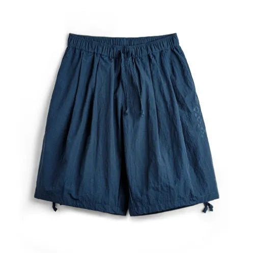 Men's Prussian blue embroidered loose-fit summer shorts on hanger