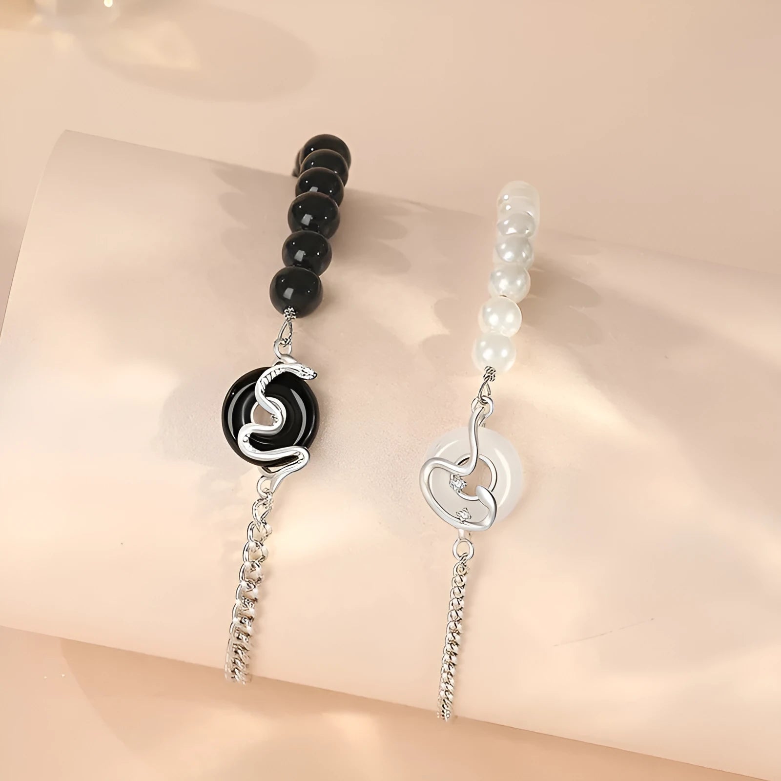 925 sterling silver couple's bracelet with obsidian pearl and snake detail in New Chinese style.