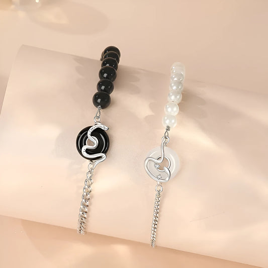 925 sterling silver couple's bracelet with obsidian pearl and snake detail in New Chinese style.