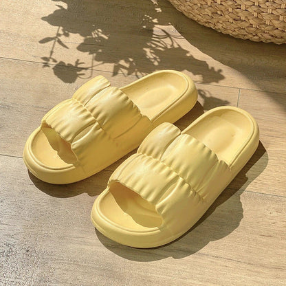 Comfortable and stylish women's bathroom slides in various vibrant colors and patterns