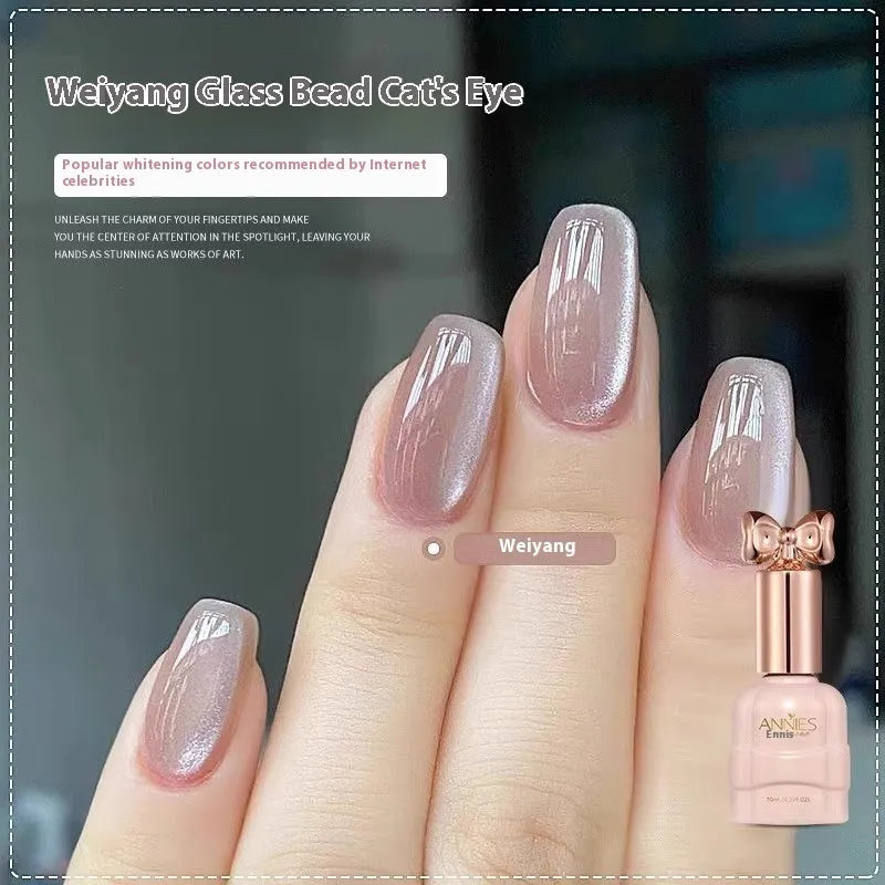 Bottle of micro glass bead cat's eye gel nail polish for magnetic nail art.