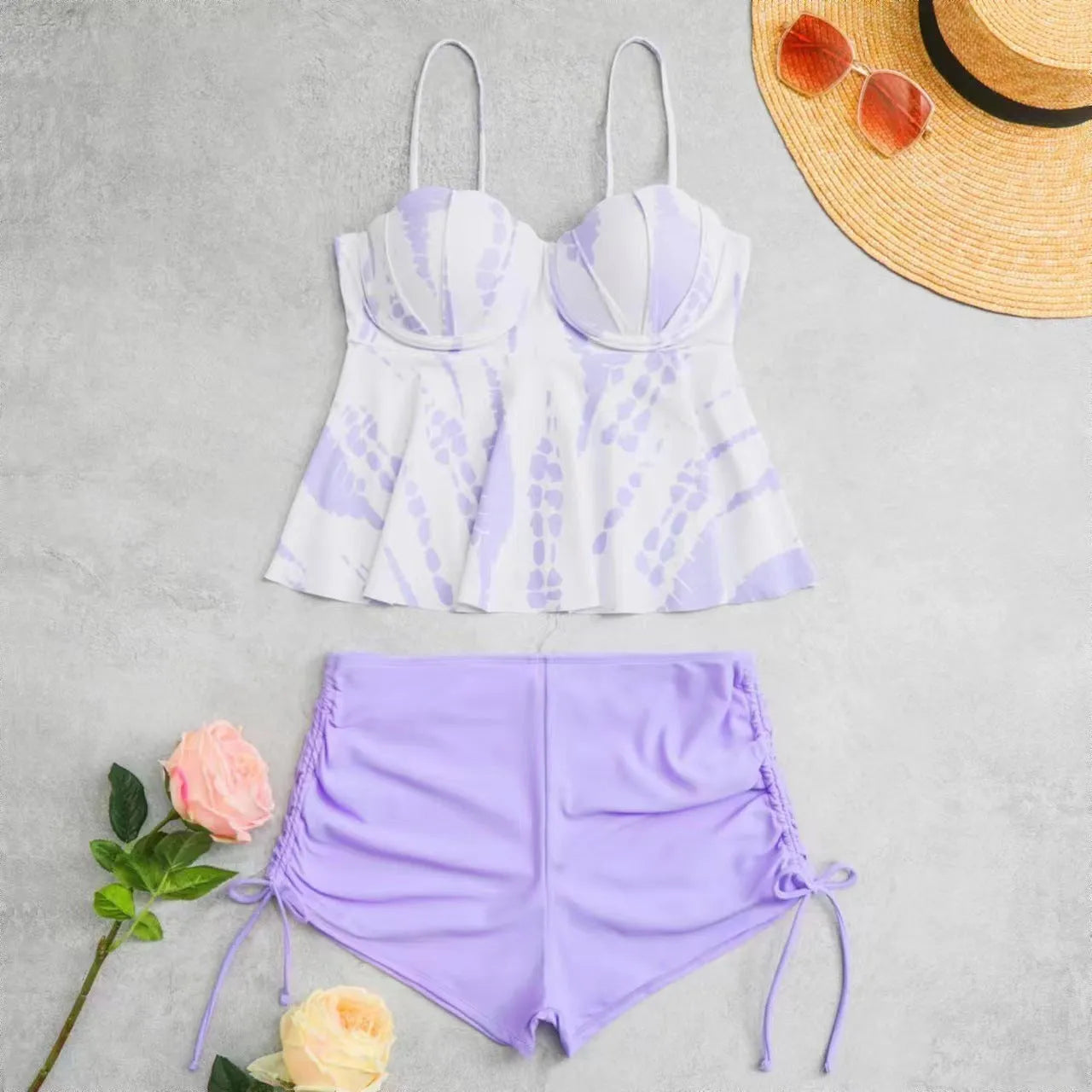 Women's hard bag printed split bikini swimsuit set in blue colour.