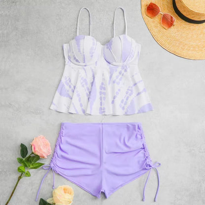 Women's hard bag printed split bikini swimsuit set in blue colour.
