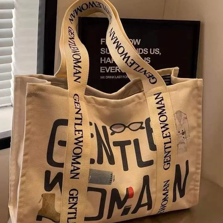 Canvas women's travel tote bag with printed patterns and shoulder straps