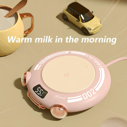 Green portable coffee mug warmer with touch controls and 100mm heating surface for office desks