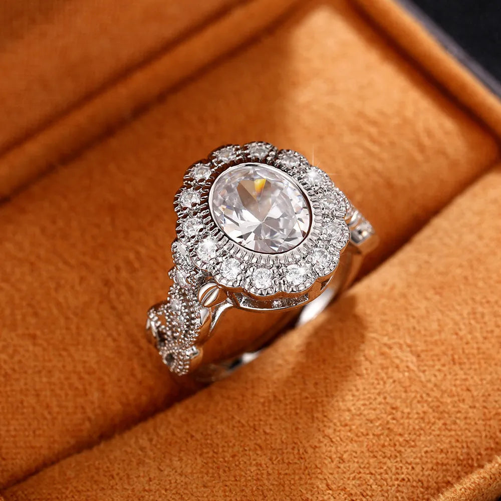 Geometric copper ring with round zircon stone in white gold colour plating.