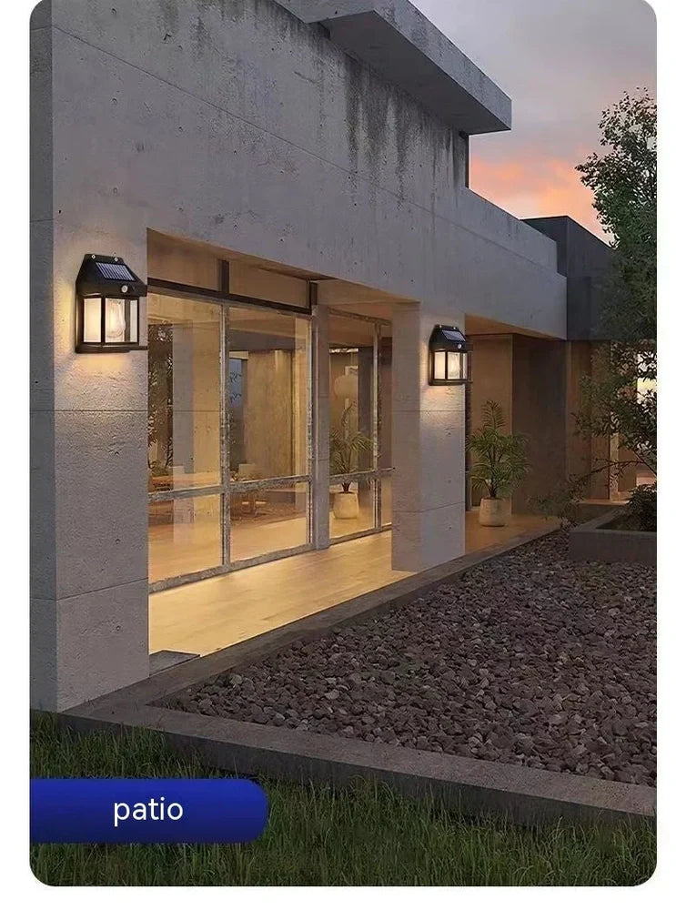 Black solar garden wall lamp with waterproof IP65 rating and automatic light sensor for outdoor installation