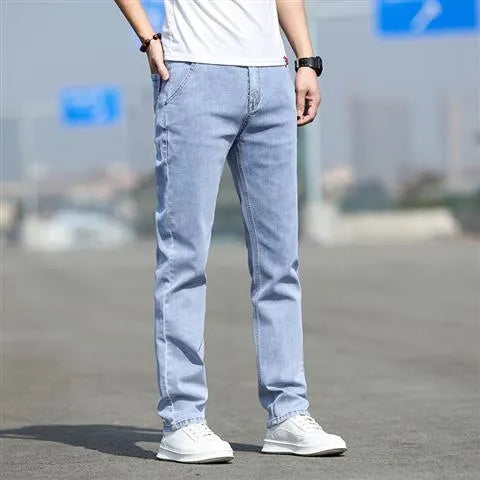 Smoky gray men's straight leg jeans with rabbit fur fabric on a hanger.