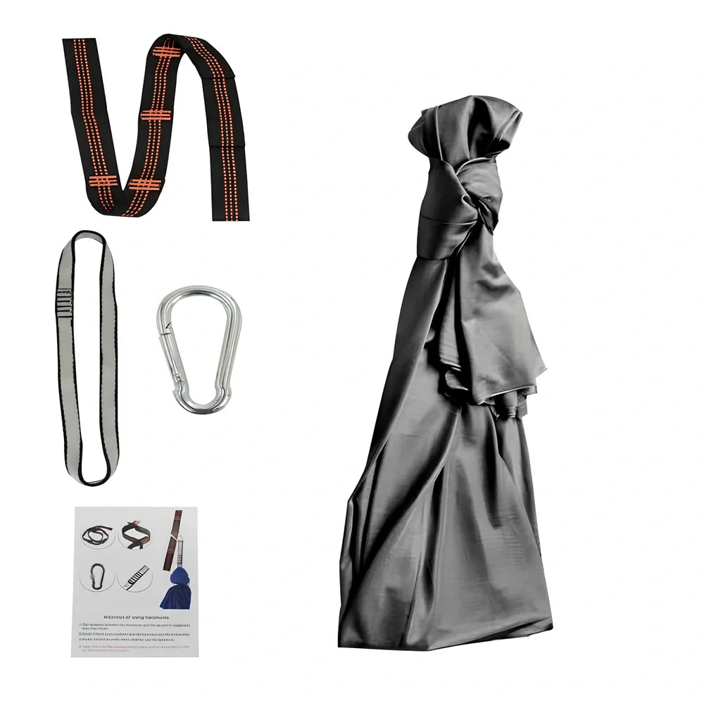 Child in black therapy swing cocoon with multi-loop daisy chain height adjustment system