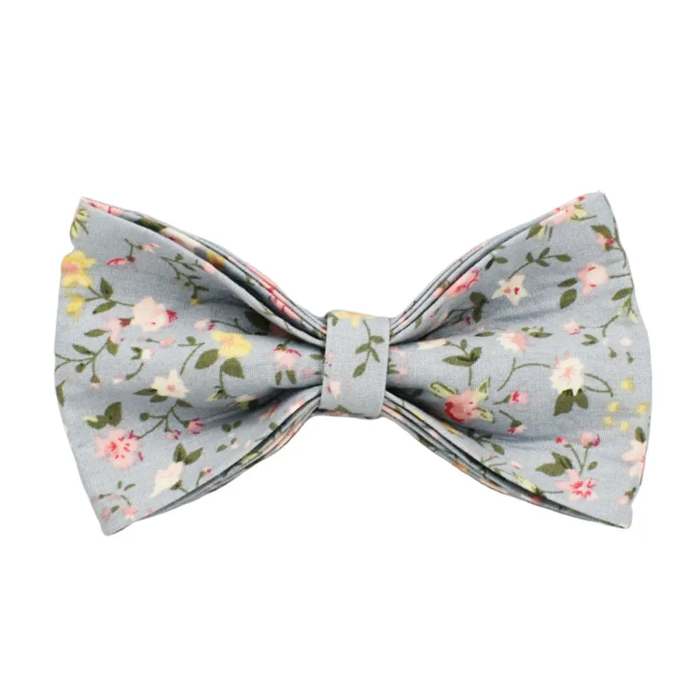 Blue floral dog collar set with adjustable sizes, includes leash, vest, bow, and poop bag on polyester cotton cloth.