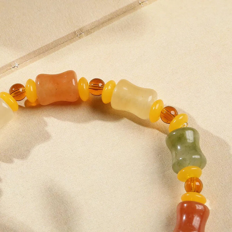 Natural Jinsi Jade small bone beads bracelet with geometric shape and Chinese auspicious patterns