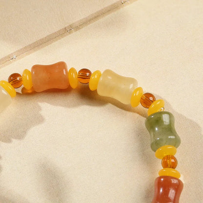 Natural Jinsi Jade small bone beads bracelet with geometric shape and Chinese auspicious patterns