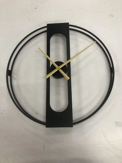 Round metal wall clock with 50cm diameter in black or gold finish showing battery compartment