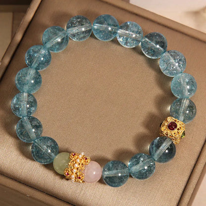 Women's flexible crystal bracelet with blue cube sugar beads and colourful crystal accents