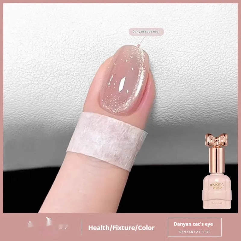 Bottle of micro glass bead cat's eye gel nail polish for magnetic nail art.