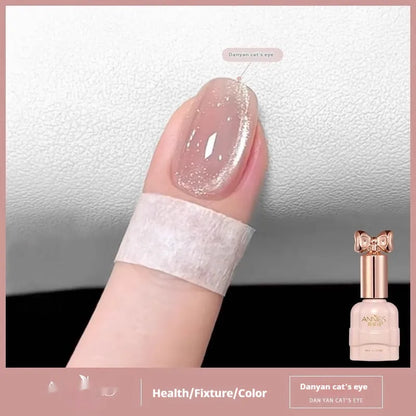 Bottle of micro glass bead cat's eye gel nail polish for magnetic nail art.