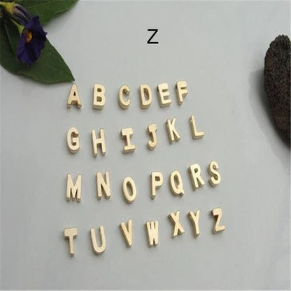Heart-shaped letter pendant necklace with clavicle chain in various metallic colors