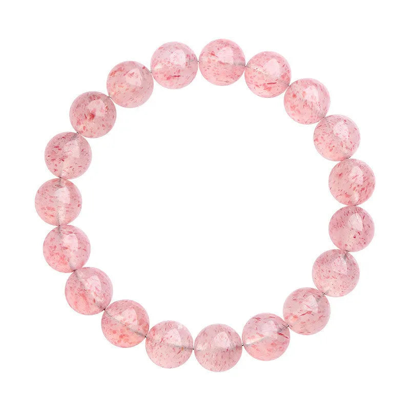 Stretch bracelet with round faceted strawberry quartz crystal beads in a white water colour.