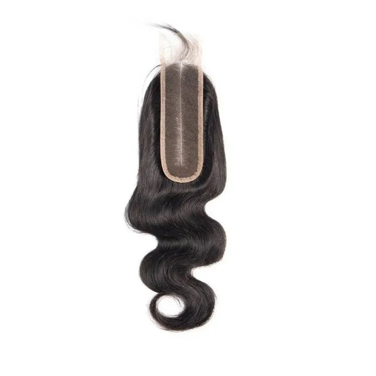 Straight natural colour human hair wig with hand-woven cap on a wig stand.