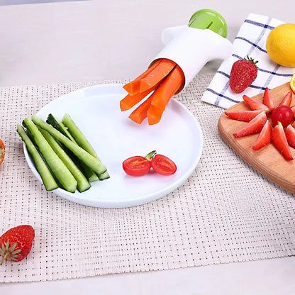 White plastic vegetable and fruit slicer with six stainless steel blades for cutting cucumbers and carrots.