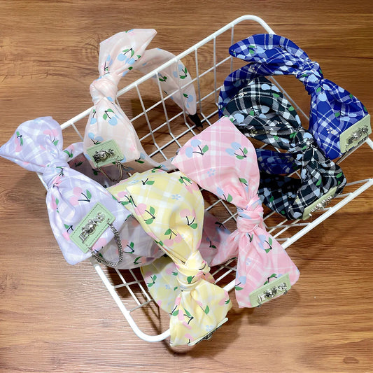 Geometric fringed headband in cloth material with manual craftsmanship details