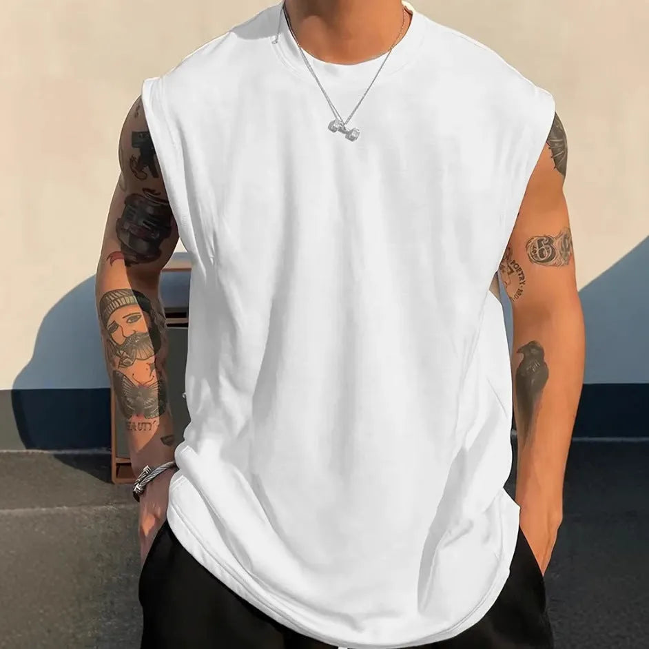 Men's loose solid colour cotton sleeveless tank top on a hanger.