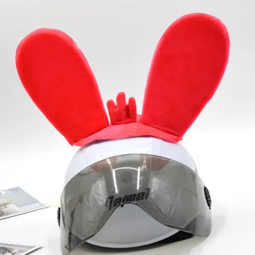 Rabbit ear ski helmet ornament with LED lighting and Velcro base attachment for helmet customisation