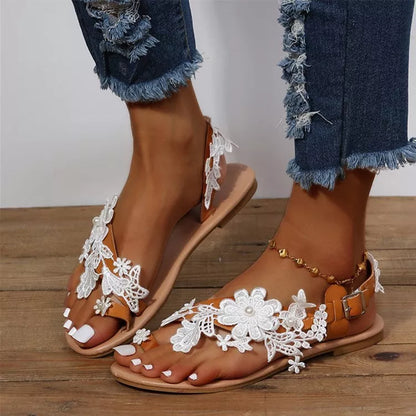 Bohemian lace sandals with floral ankle strap in white and black
