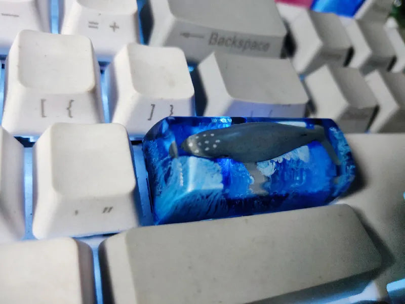 Custom mechanical keyboard keycap featuring a detailed koi fish scene moulded from durable coloured resin, compatible with Cherry MX style mechanical switches and supplied in a single unit with a choice of key profile sizes.
