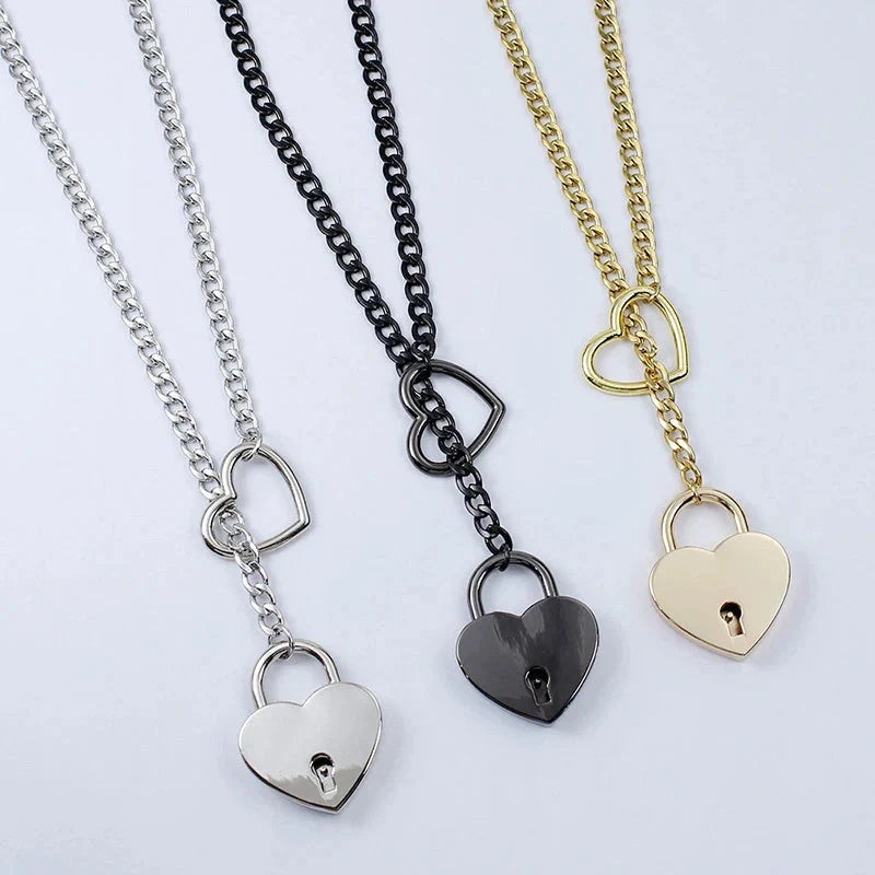 Adjustable heart-shaped O-ring slip chain necklace in black, silver, and gold