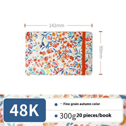 Feiluniao watercolour notebook with fabric cover, 185mm length, open to show paper for painting.