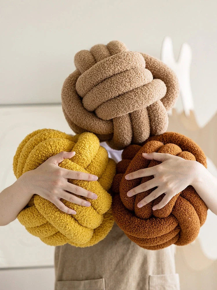 Spherical lamb wool cushion with hand-knotted surface in Nordic design, 27-30cm diameter