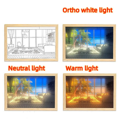 LED illuminated decorative picture light on a table showing a scenic landscape image glowing from within.