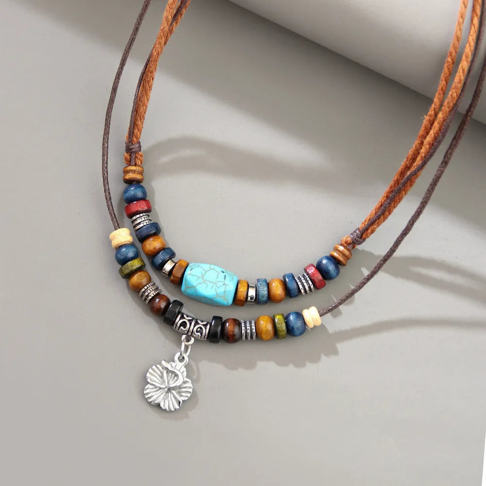 Men's wooden bead necklace with turquoise beads, wax rope cord and alloy geometric flower pendant