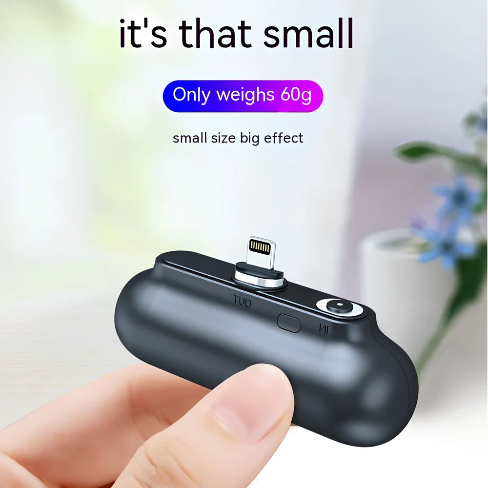 Black and white magnetic mini power bank showing compact dimensions and interchangeable charging heads