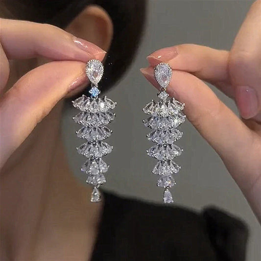Sparkling crystal Christmas tree earrings with a dazzling design, perfect for holiday parties and events